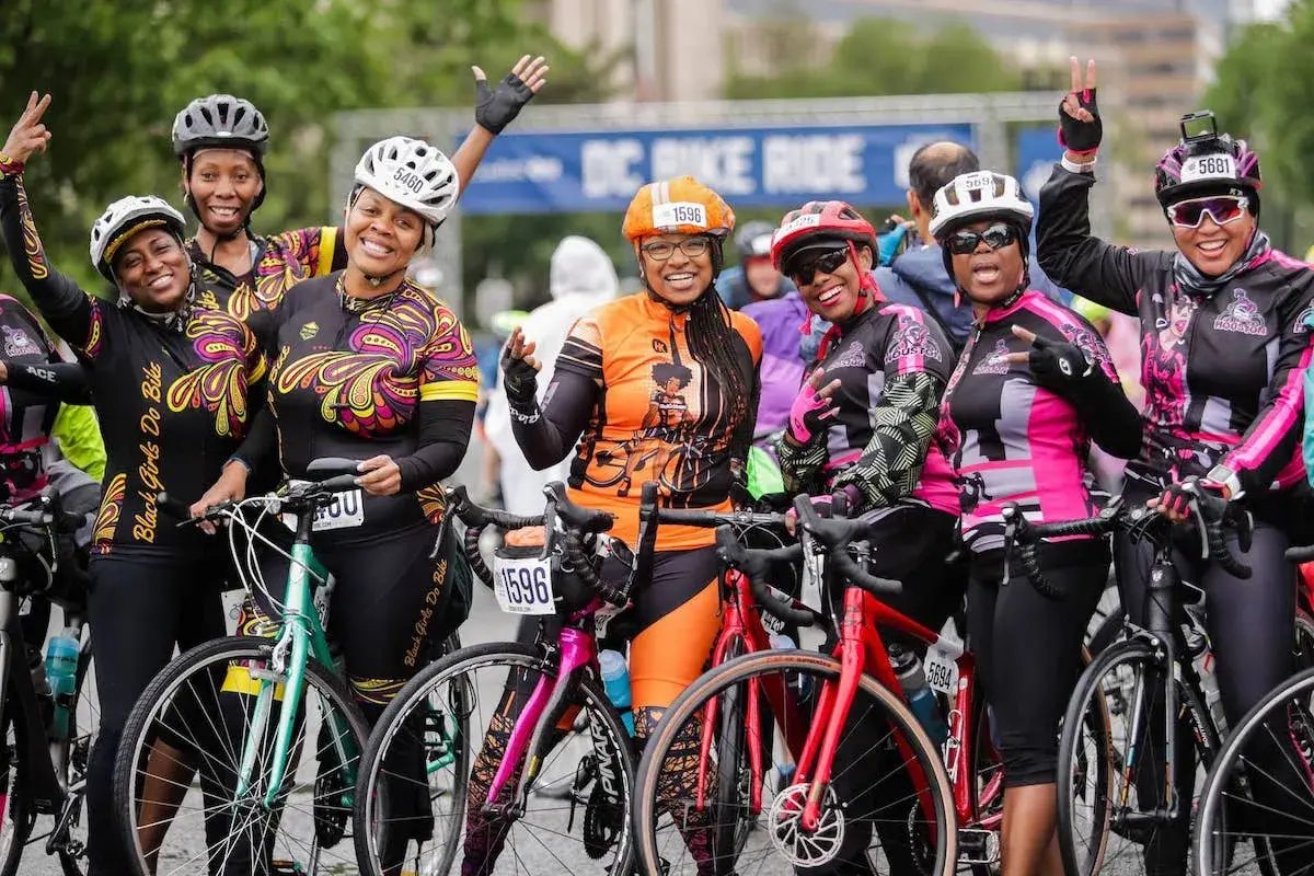 Women posing for camera after biking